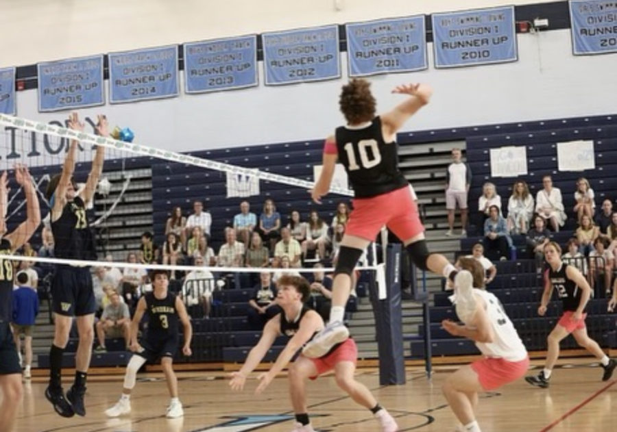 Jake Laborde ‘22 Graduate Goes Up for A Spike In the NHIAA Division 1 Boys Volleyball Championship