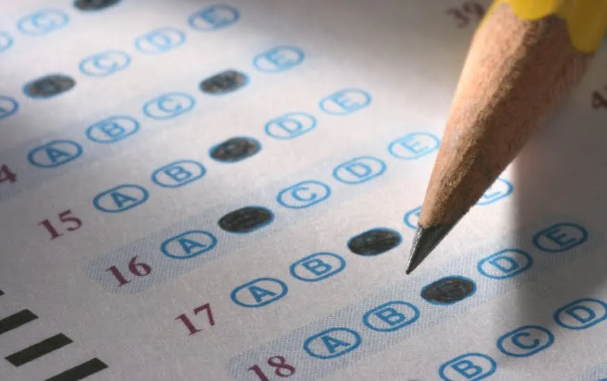A student fills out a bubble test sheet for the SAT, which was originally produced on paper. Now, with the realm of education moving online, the SAT will be fully digital by 2024.