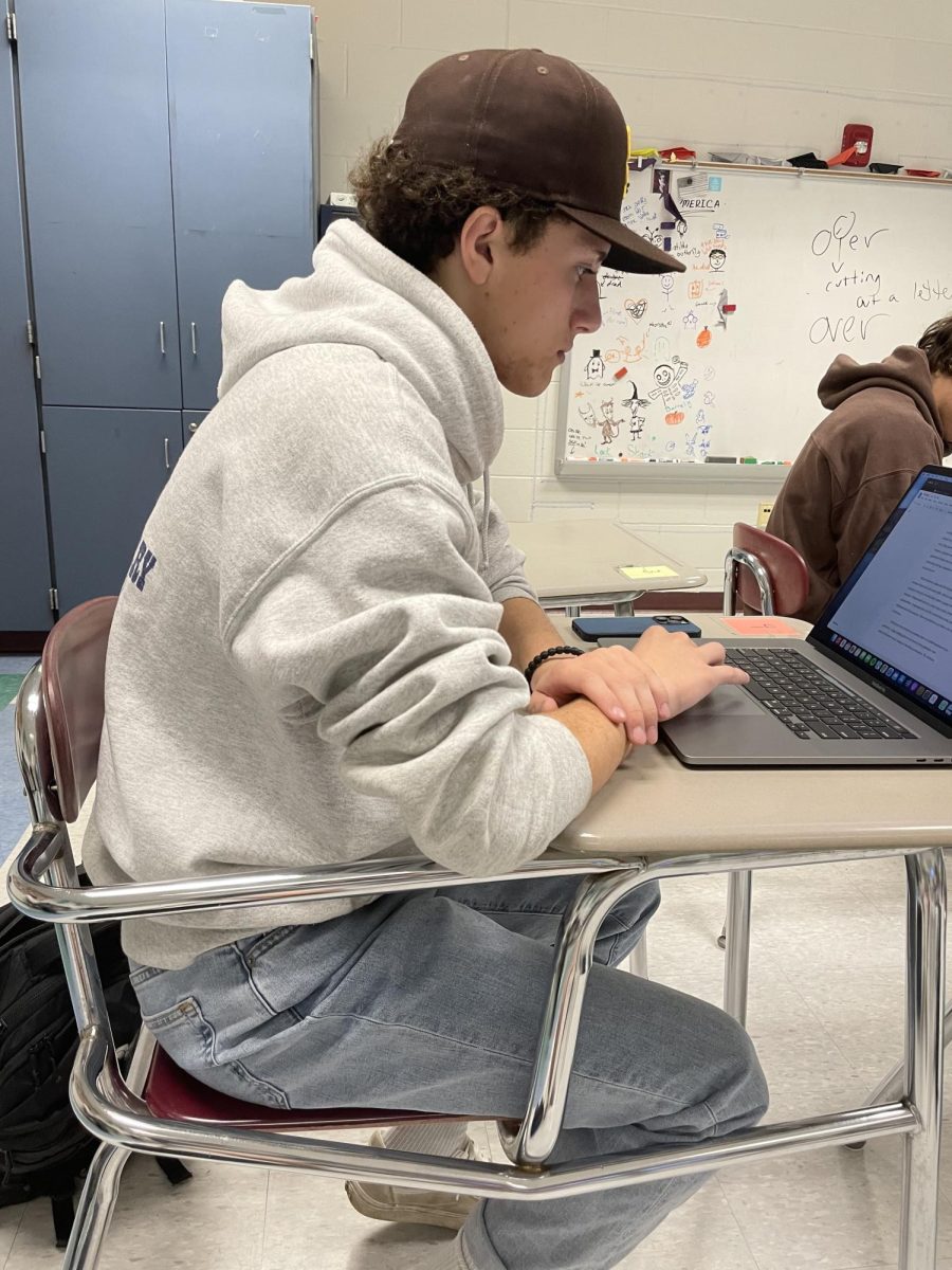 Andrew Eckman ‘24, busy working on his article. He has been called young-looking his entire life. “I feel like I look the same age as all the other seniors,” said Eckman.