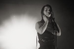 Singer-songwriter Mitski performs at a concert. (David Lee from Redmond, WA, USA, CC BY-SA 2.0, via Wikimedia Commons)