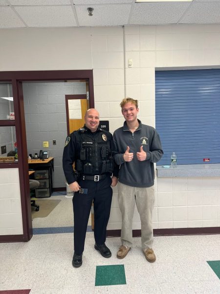 Officer Hooper is standing next to student Bradley Noble ‘24 ensuring the safety of the staff and students here at HB. Officer Hooper is a new SRO but is always willing to help students to talk about school safety.