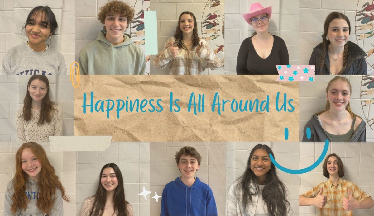 HBHS+students+stand+smiling.+In+looking+around+the+school%2C+you+begin+to+notice+that+happiness+is+all+around+us.
