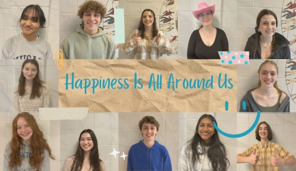 HBHS students stand smiling. In looking around the school, you begin to notice that happiness is all around us.