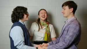 Merrily We Roll Along’s three ‘Old Friends’ are their regular silly selves in this promotional picture. HB’s production stars Jakob Kolb ‘27, Emma DiGennaro ‘25, and Colby Hallett ‘25 as Charley, Mary and Frank (pictured left to right). “I have loved working with Jakob and Colby in this production,” says DiGennaro. 