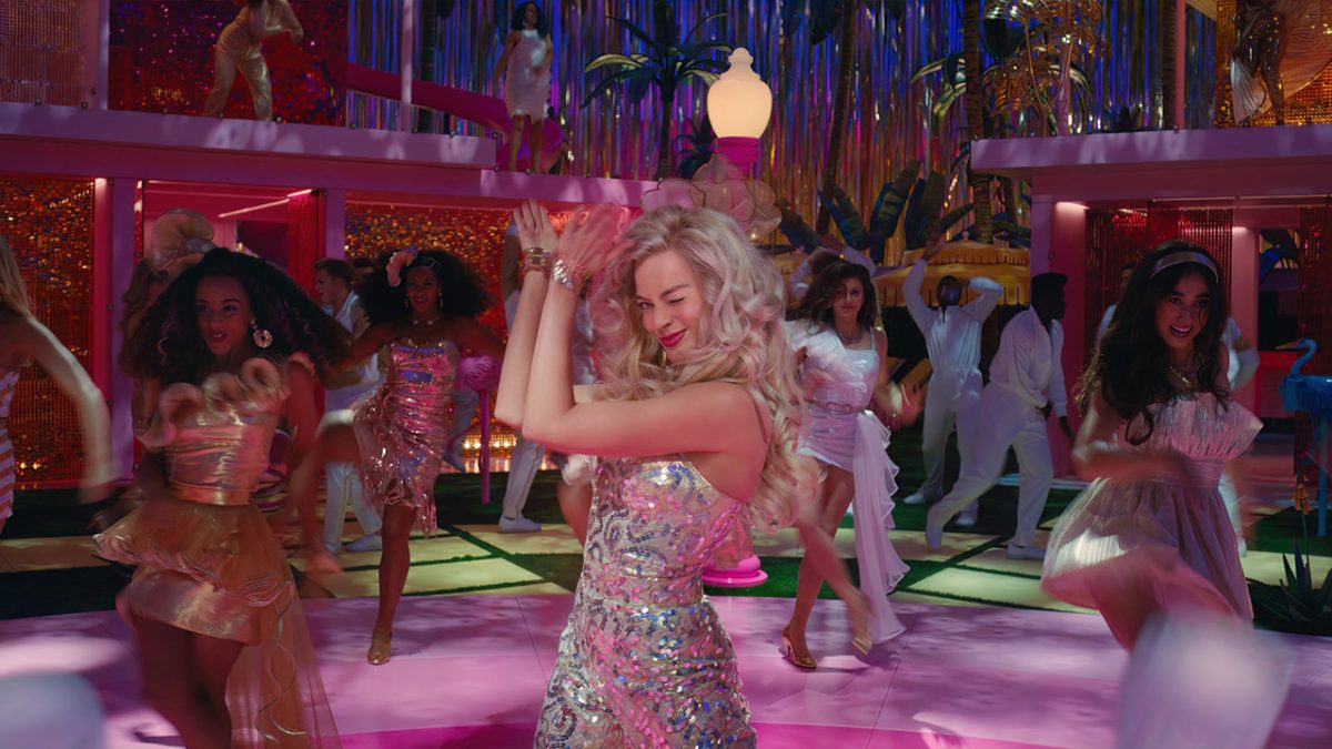 Stereotypical Barbie (played by Margot Robbie) dances in a party scene from Barbie. The Greta Gerwig-directed film became the highest-grossing movie of 2023 with $1.44 billion worldwide and broke the record for the highest-grossing female-directed film of all time. “What I think really contributed to the success was the idea of dressing up and going to Barbie. Everyone wore pink…it was the summer of girls,” said HB film studies teacher Victoria Flaherty. (Image courtesy of Warners Bros. Pictures)