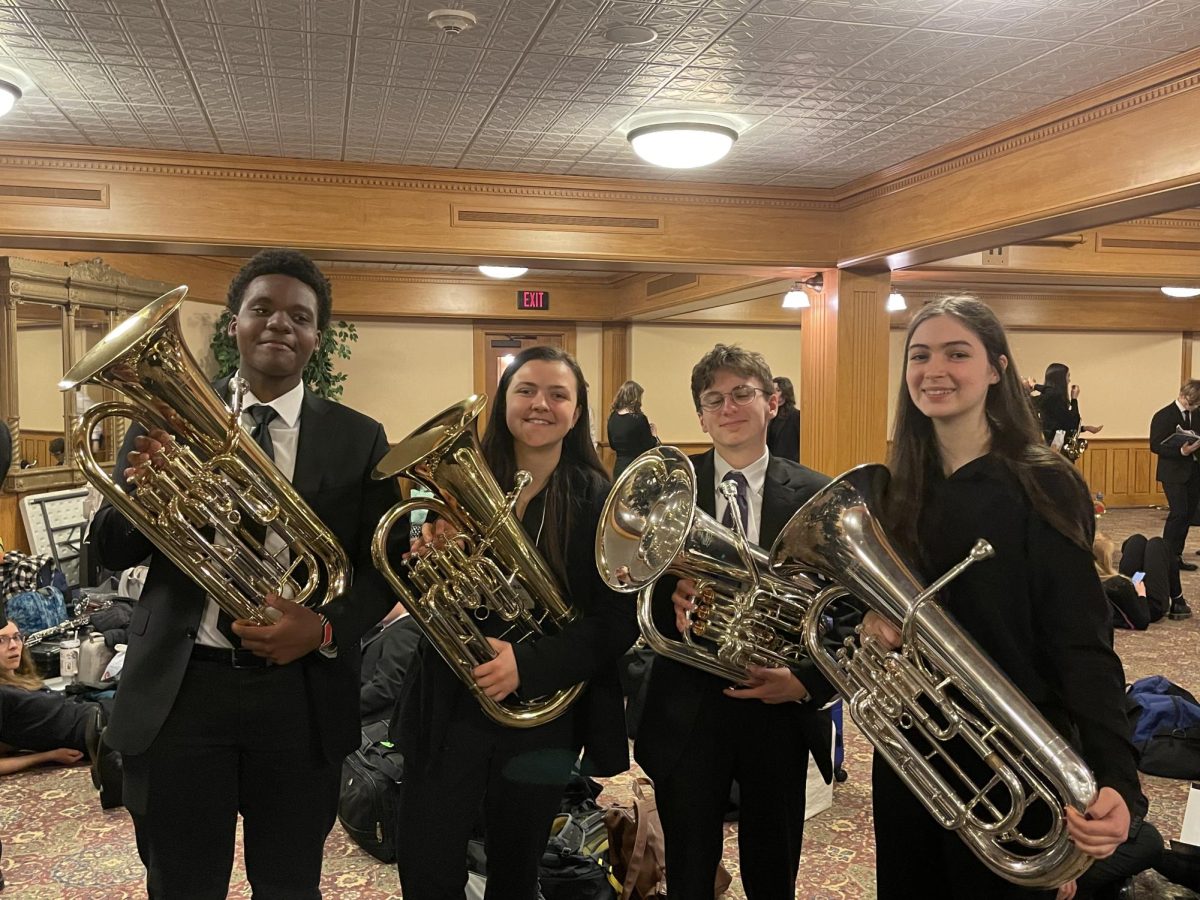 Miranda Bergeron 25 stands with fellow euphonium players at the New Hampshire All-State Music Festival. | Courtesy Bergeron