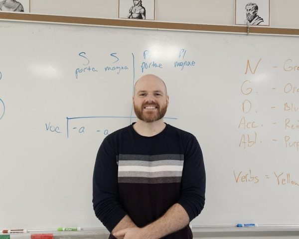 Mr. MacFarline, the HBHS Latin Teacher, stands preparing to teach a class. He is very dedicated to his work and is a great teacher, but unfortunately, he doesn’t have a CAVBlock this year. He says CAVBlocks are great because, “I'm a very good learner one on one with somebody, like if I can have them sit down and just kind of explain it to me, especially if it's a difficult concept.”