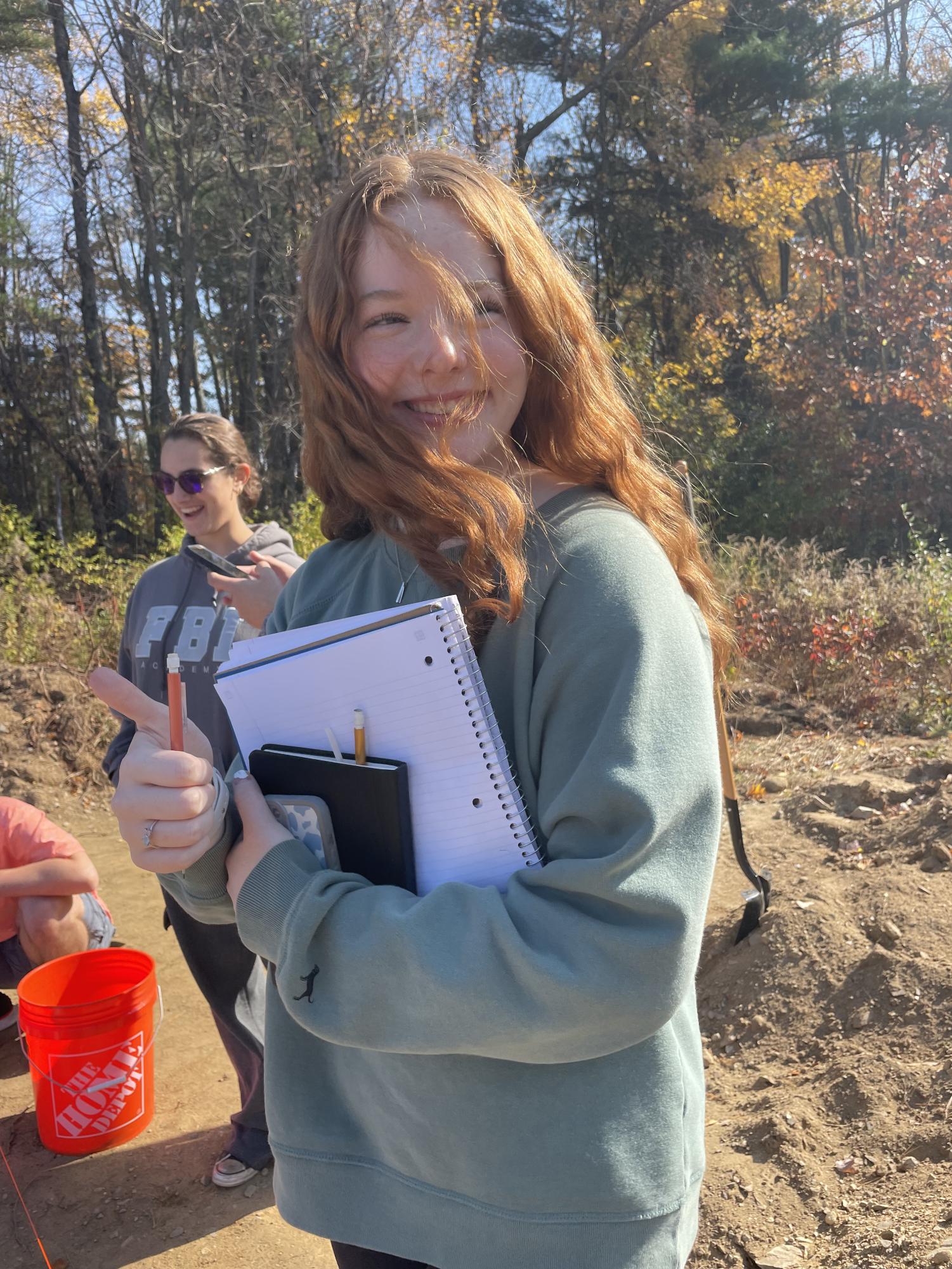 Student Tess Brown ‘25 sketches the archeological dig site. “We had to compare the different sketches to see the progress we made throughout the week,” she said.