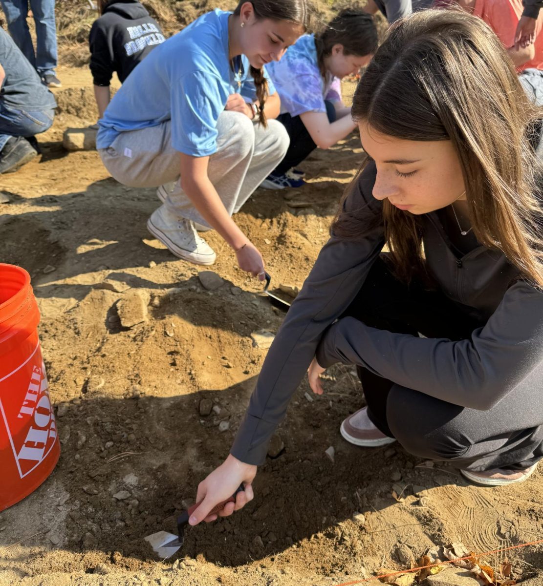 Students in Archeology use tools in a mock excavation. As a class that focuses on hands-on learning, students are able to gain crucial life skills. “[The class] is more hands-on than I thought, and I'm learning way more with physical activities than I do in the classroom,” said student Tess Brown ‘25.