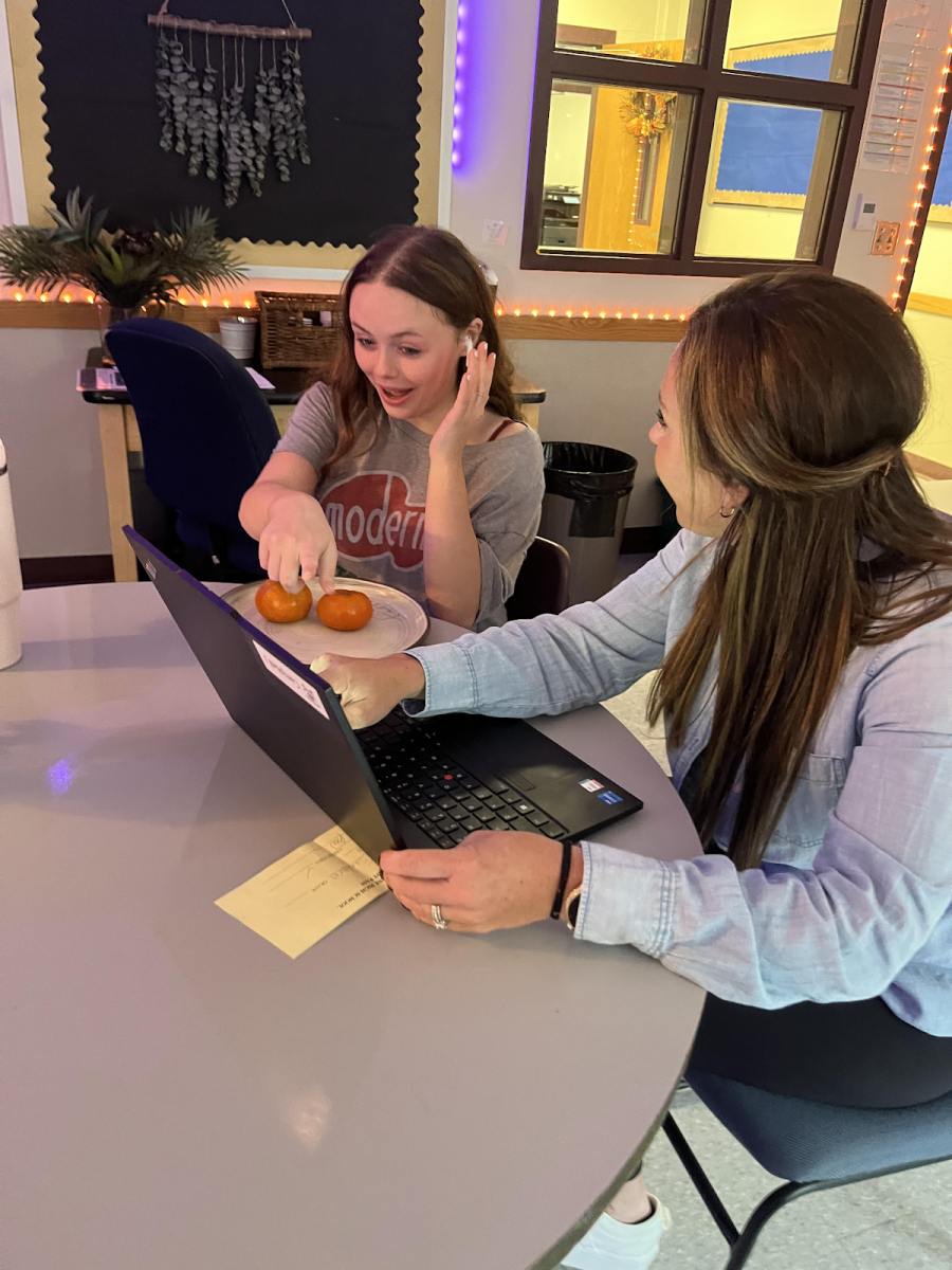 Directed Study teacher Jennifer Campbell is always kind and helpful and assists kids with their work. In this picture, she is helping Aubrey Craig ‘26 with her ROTC information for her CTE program. “I always want my kids to be happy and feel safe in my classroom,” said Campbell.