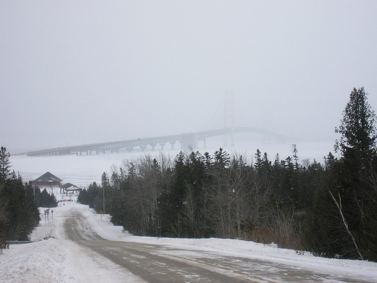 Slippery conditions leave drivers stranded and stuck in heavy snow. The low visibility creates a dense film, making it almost impossible to see ahead while driving.  Having a vehicle that can handle snow and tires with good traction is a necessity when living in the areas surrounding the Great Lakes. 
(CC BY-SA 2.5, via Wikimedia Commons)