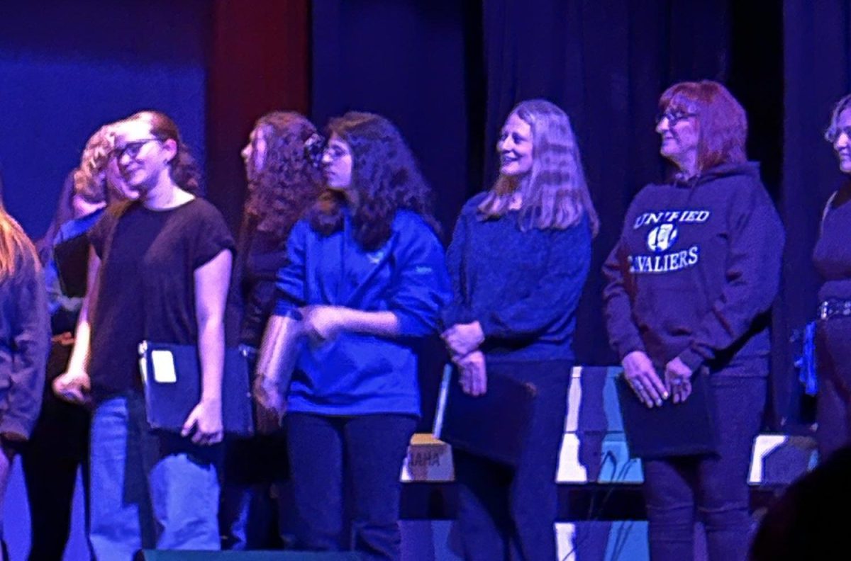 The Student-Faculty Choir performed at Guitar Night on Dec. 13.