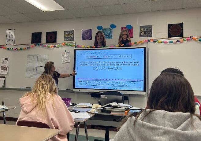 Elizabeth Kolb teaches her fifth-period Precalculus class, made up of juniors and seniors. Kolb’s in-depth on-the-board examples, as shown here, “enrich [our] learning experience,” according to student John Torpey ‘26.