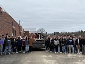 Hollis Brookline High School National Honor Society members pose with their completed benches for the Beaver Brook Association. (Courtesy Melissa Moyer)