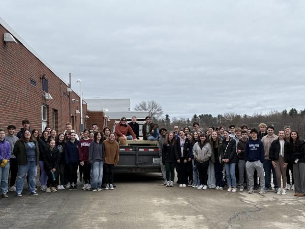 Hollis Brookline High School National Honor Society members pose with their completed benches for the Beaver Brook Association. (Courtesy Melissa Moyer)