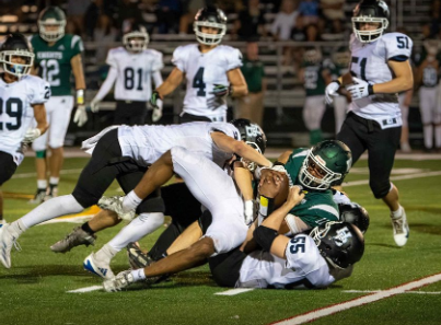 Hollis Brookline vs Timberlane game "HB tackling Timberlane player"