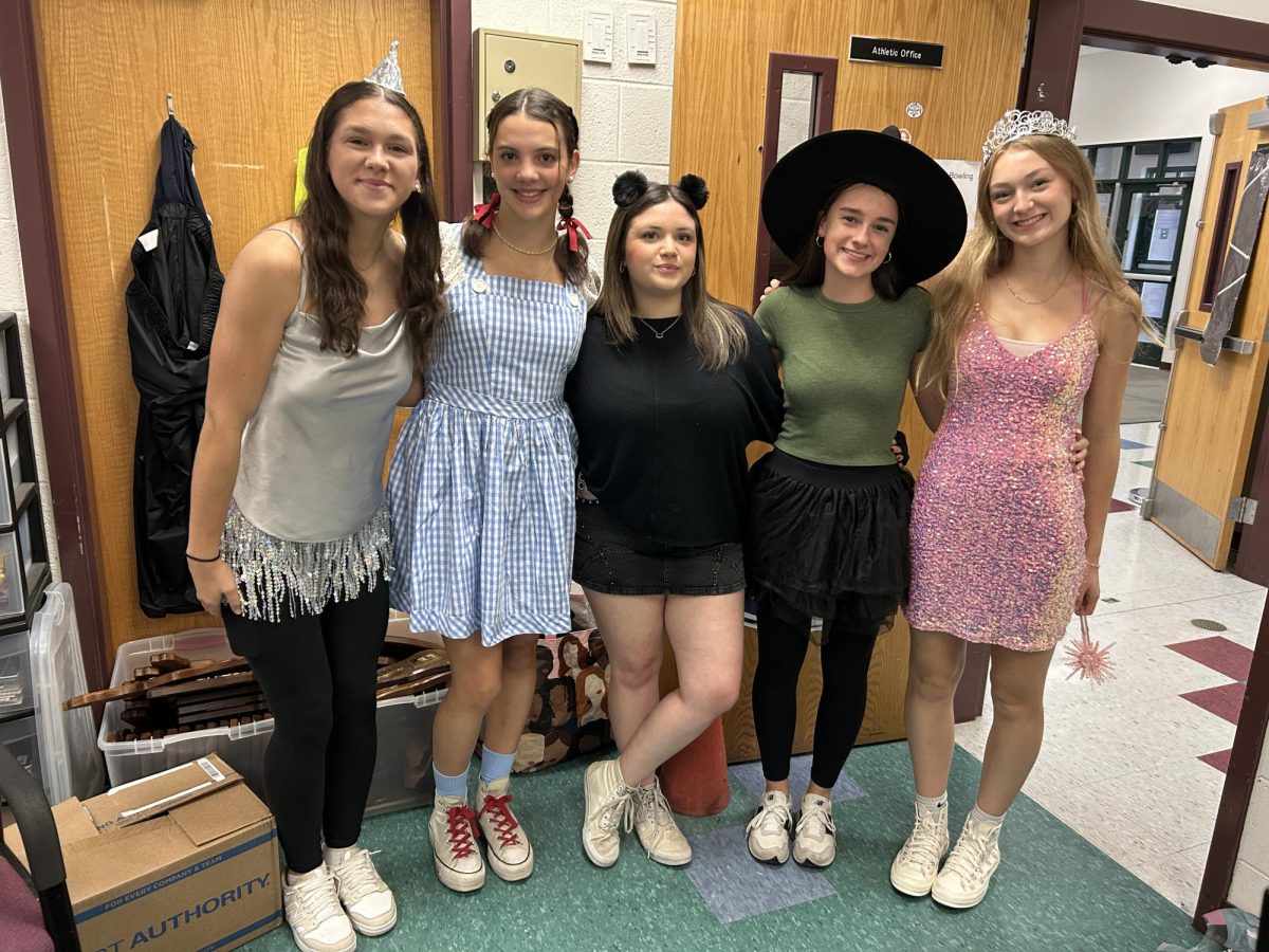 Grace Dow, Caroline Crawford, Lauren DeRego, Kylee Sova, Kylee Sorrell (from left to right), blowing away this Halloween with their Wizard of Oz themed group costume!