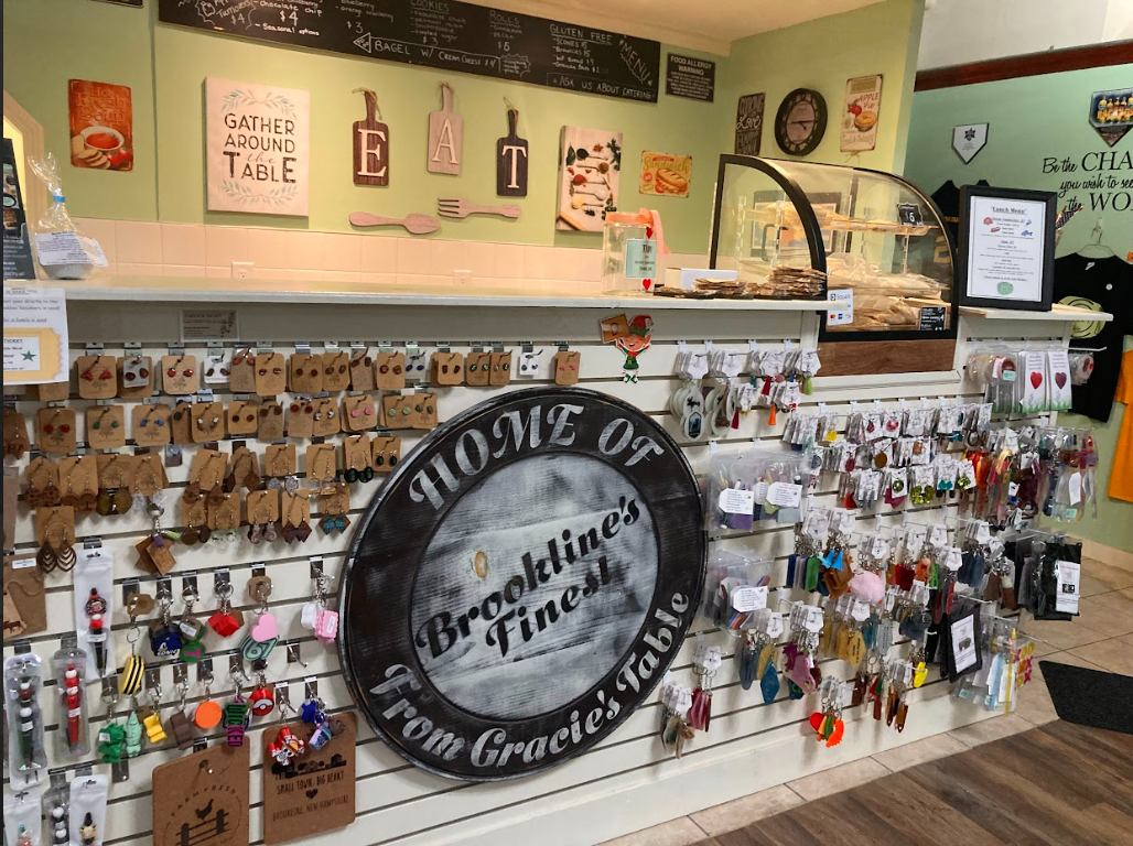 Front counter of Brookline's Finest with their full name store logo